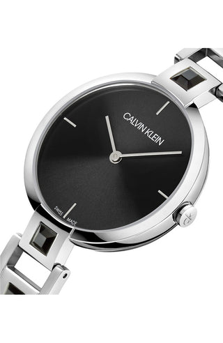 Angle shot of Calvin Klein Mesmerize K9G23UB1 Black Dial Grey Stainless Steel Womens Watch on white background