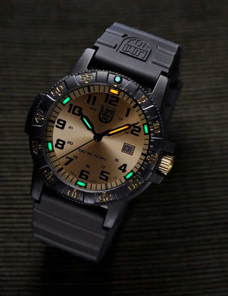 Angle shot of Luminox XS.0325.GP Gold Dial Black Silicone Unisex Watch on white background